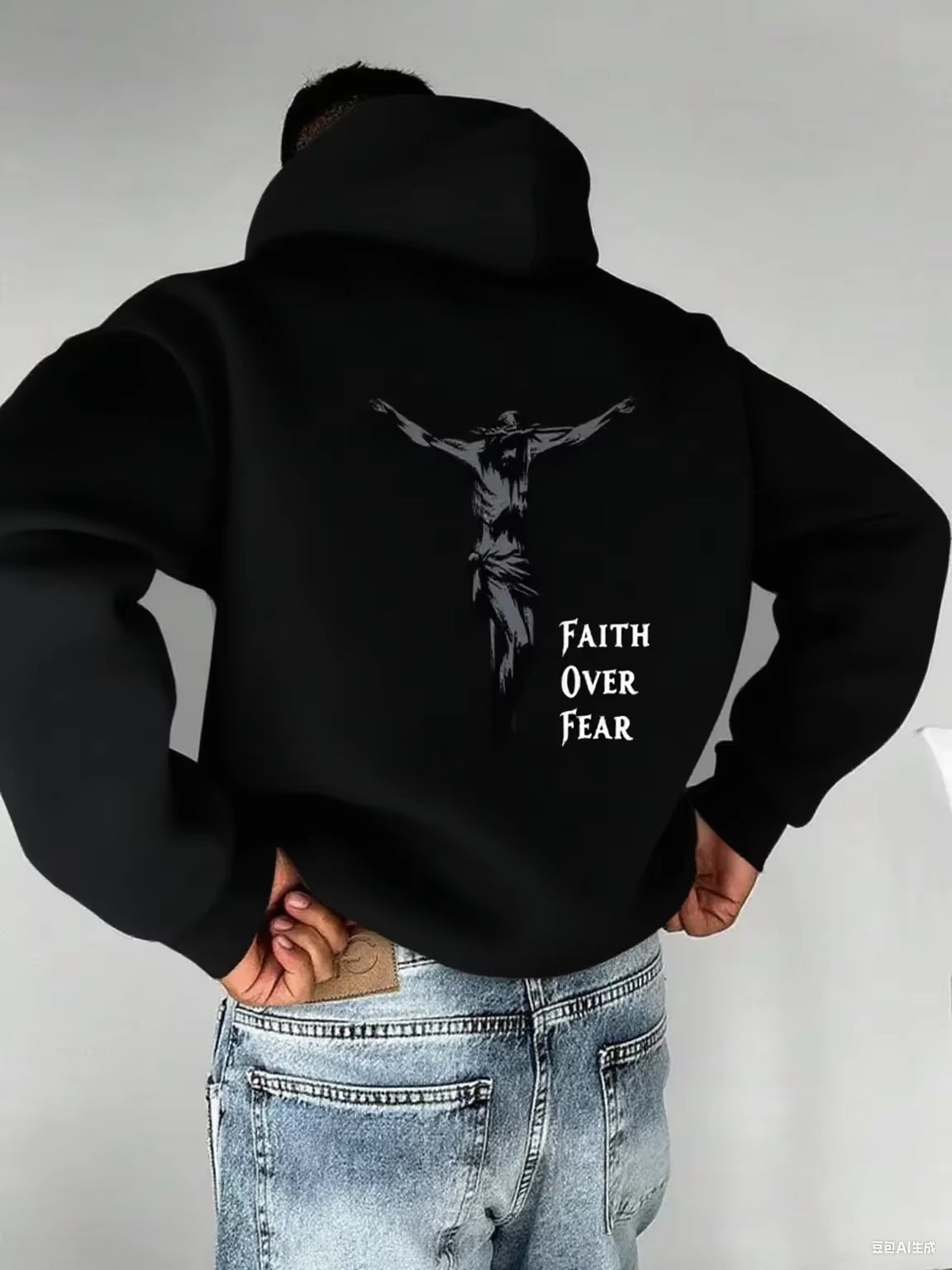 A Men'S Hoodie with the Words "Christian Faith Overcomes Fear" Printed on It Features a Cross-Shaped Design on the Back